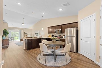 Bellevue apartment for rent - A modern kitchen with a dining table and chairs.