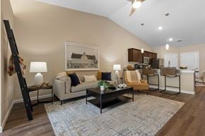 Bellevue apartment for rent - A living room with a couch, chairs, and a coffee table.