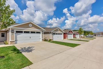 Burlington apartment for rent - A row of houses with garages and driveways.