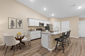 Canton apartment for rent - A kitchen with a table and chairs.