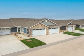 Crystal Lake apartment for rent - A house with a grey roof and a white garage door.