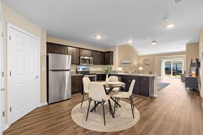 Delaware apartment for rent - A modern kitchen with a dining table and chairs.