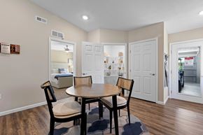 Fairborn apartment for rent - A dining room with a table and chairs.