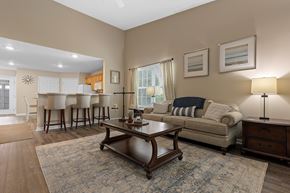 Fort Wayne apartment for rent - A living room with a couch, chairs, and a coffee table.