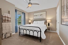 Galloway apartment for rent - A bedroom with a large bed and a ceiling fan.