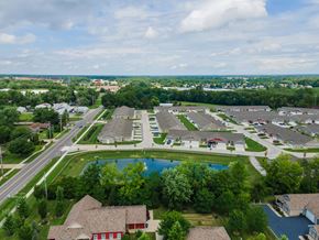 Groveport apartment for rent - A bird's eye view of a suburban neighborhood with a swimming pool.