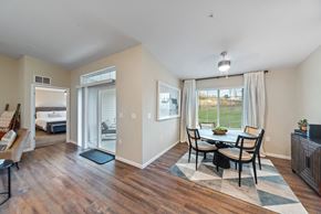 Holt apartment for rent - A dining room with a table set for four.