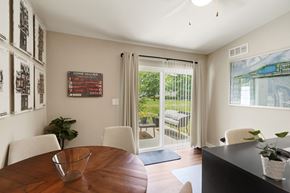 Indianapolis apartment for rent - A dining room with a wooden table and chairs.