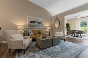 Lafayette apartment for rent - A living room with a couch, chair, and a rug.