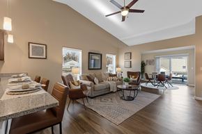 Lake Wylie apartment for rent - A well-lit dining room with a table set for a meal.