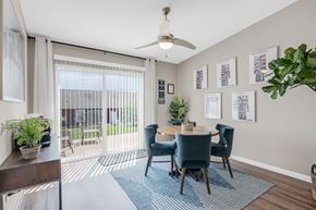 Louisville apartment for rent - A dining room with a table set for four.
