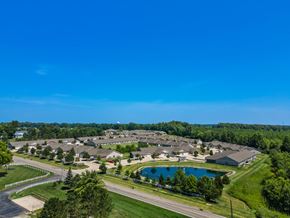 Marysville apartment for rent - A bird's eye view of a residential area with a swimming pool.