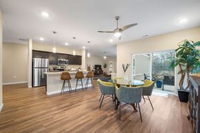 Marysville apartment for rent - A modern kitchen with a dining table and chairs.