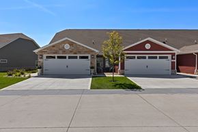 Marysville apartment for rent - A house with two garages and a driveway.