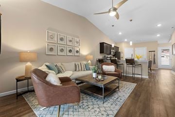 Marysville apartment for rent - A living room with a brown leather couch and a coffee table.