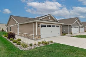 Maumee apartment for rent - A house with a garage and a driveway.