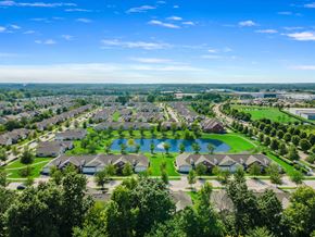 New Albany apartment for rent - A bird's eye view of a residential area with a large swimming pool.