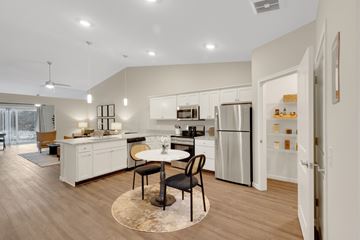 New Haven apartment for rent - A modern kitchen with a dining table and chairs.
