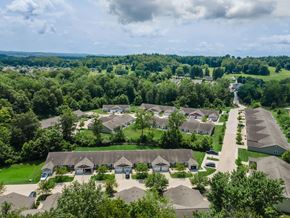 Newark apartment for rent - A bird's eye view of a residential area with houses and trees.