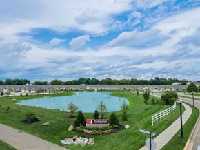 Groveport apartment for rent - A beautiful aerial view of a community with a large swimming pool and a sign that reads "Redwood".