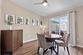 Pataskala apartment for rent - A dining room with a table and chairs and pictures on the wall.