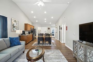 Plainfield apartment for rent - A modern living room with a grey sofa and a coffee table.