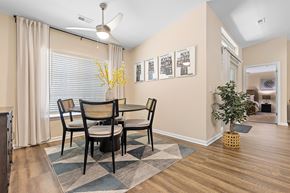 Simpsonville apartment for rent - A dining room with a table and chairs.
