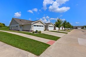 Sugarcreek Township apartment for rent - A house with a driveway in front of it.