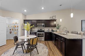 Superior Township apartment for rent - A modern kitchen with a dining table and chairs.