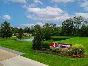 Sylvania apartment for rent - A sign that says Redwood in front of a grassy area.