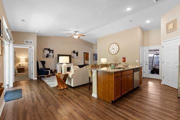 Union Township apartment for rent - A living room with a white couch and a wooden floor.