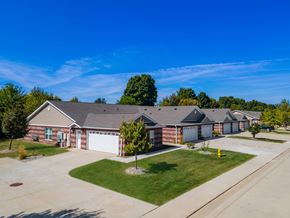Washington Township apartment for rent - A row of houses with a clear blue sky above them.