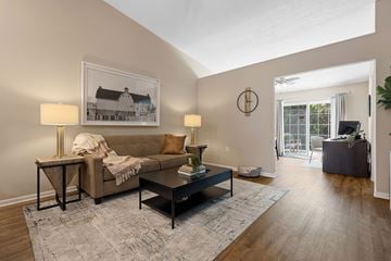 Washington Township apartment for rent - A living room with a couch, a coffee table, and a painting on the wall.