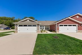 West Jefferson apartment for rent - A two-car garage is attached to a house.
