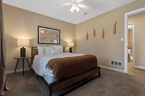 Westfield apartment for rent - A bedroom with a large bed and a ceiling fan.
