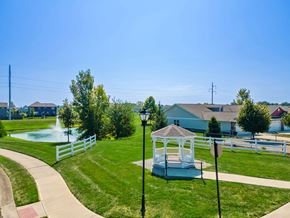 Westfield apartment for rent - A gazebo sits in the middle of a grassy area with a fence and houses in the background.