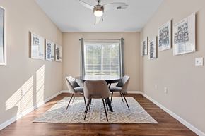 Ypsilanti apartment for rent - A dining room with a table and chairs.