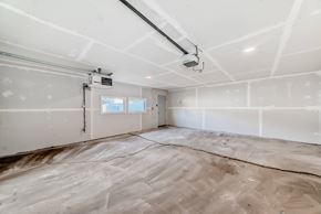 Edmonton apartment for rent - A room with white walls and a window is under construction.