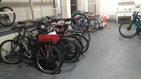 Vancouver apartment for rent - A bunch of bicycles are parked in a garage.