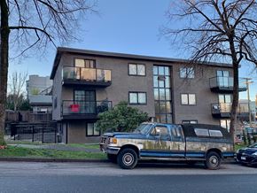 Vancouver apartment for rent - a truck is parked in front of an apartment building