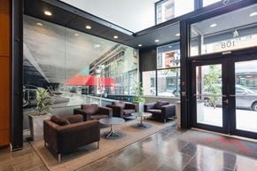 Vancouver condo for rent - A glass wall with a red arrow drawn on it.