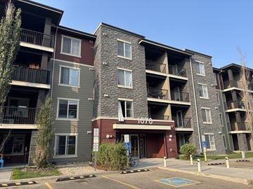 Edmonton condo for rent - The image shows a multi-story apartment building with the number 1070 on the front.