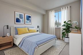 Marysville apartment for rent - A bedroom with a large bed and a window with curtains.
