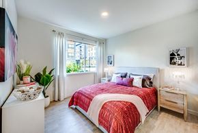 Lynnwood apartment for rent - a bedroom with a bed and a window