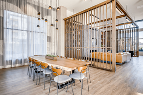 Lynnwood apartment for rent - a dining room with a wooden table and chairs