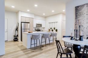 Marysville apartment for rent - an open kitchen and dining area with a table and chairs
