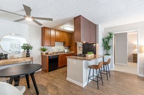 Poway apartment for rent - A kitchen with a table and chairs.