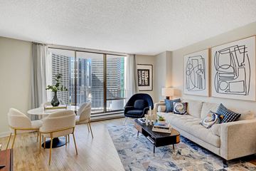 Seattle apartment for rent - a living room with a large window and a couch