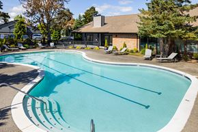 Tigard apartment for rent - A large outdoor swimming pool with lane markers.