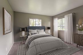 Chula Vista apartment for rent - a bedroom with a bed and two windows